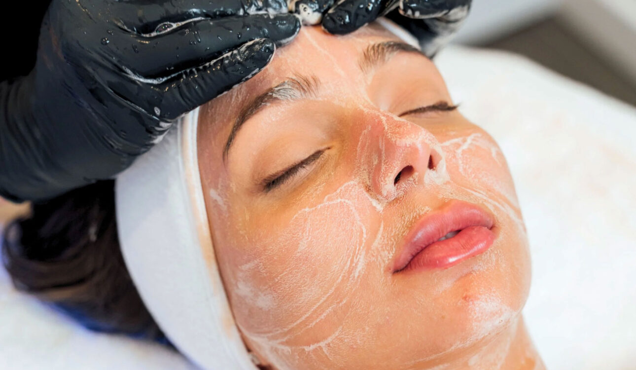Woman receiving express facial treatment at Skinova Medspa in NYC to hydrate summer skin